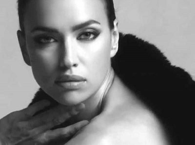 Ирина Шейк вышла в свет в черном мини-платье с глубоким декольте